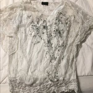 Lacy top with white undershirt